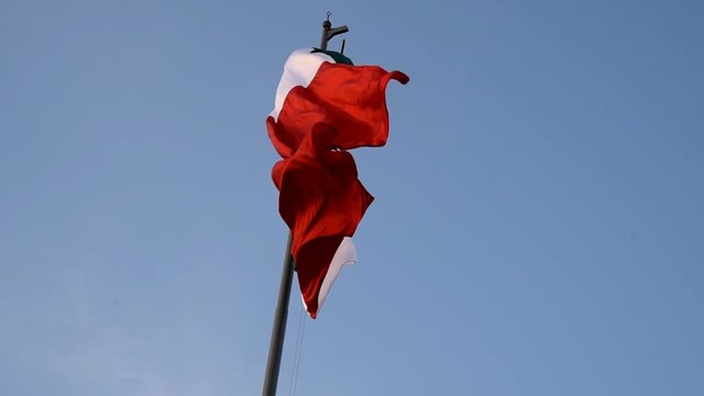 Mexican flag agitated in the wind,closeup
