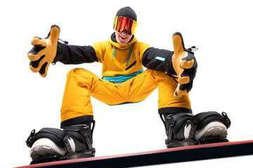 Man snowboarder on snowboard in sportswear isolated white background, bottom view