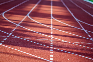 Red running sport track background and texture. Sport running track concept.