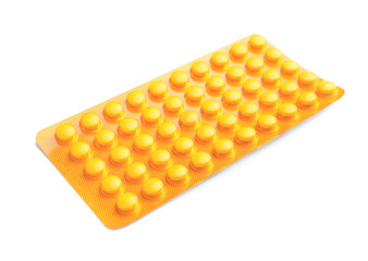 Blister pack with pills on white background