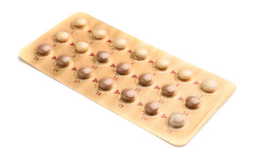 Birth control pills on white background