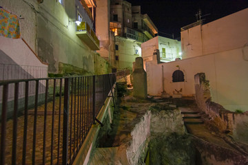 Night view of a picturesque view of the streets of the historic center of the ancient seaside...