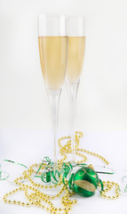 Two glasses of white wine with christmas decorations