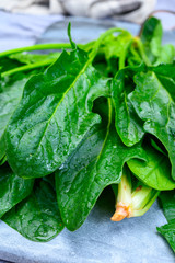 Young fresh leaves of green organic spinach ready to cook