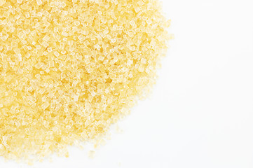 Heap of sugar on white background