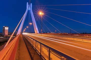 02.04.2020, Ludwigshafen: Light trails of cars on a bridge at Ludwigshafen in Germany.