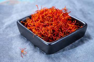 Fototapeta premium Real red dried shaffron spice close up