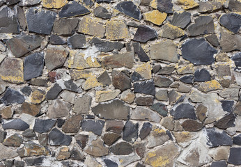 Wall pattern made of stone. Texture of a stone wall as background.