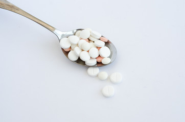 spoon full of pills