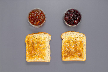 Toasted bread with fruit jams, top view with copy space.