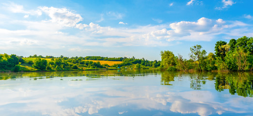 Pond in spring afternoon © Givaga