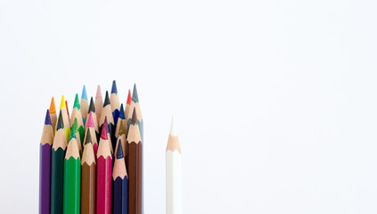 colored pencils on white background