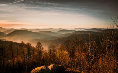Sunrise over rocky winter landscape in Palatinat Forest