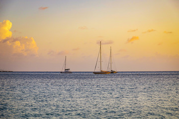 Fototapeta premium Sailboats at sunset.Yacht at sea