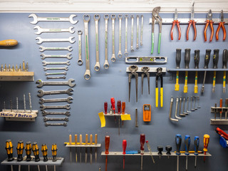 A wall of tools in a workshop