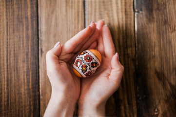 Delicious Easter eggs of guinea hen on a wooden background to the traditional Easter feast.