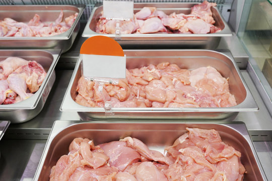 Fresh chicken fillet on displays in a market