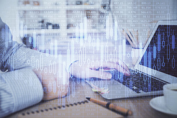 Multi exposure of stock market chart with man working on computer on background. Concept of financial analysis.