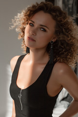 Fototapeta premium Young sexy blonde woman posing in fashionable swimsuit. Girl with ideal body. Studio shot.
