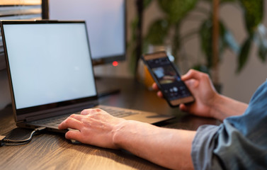 home office woman working on computer in sunset lights