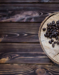 Coffee beans and old wooden background, And space add for your text