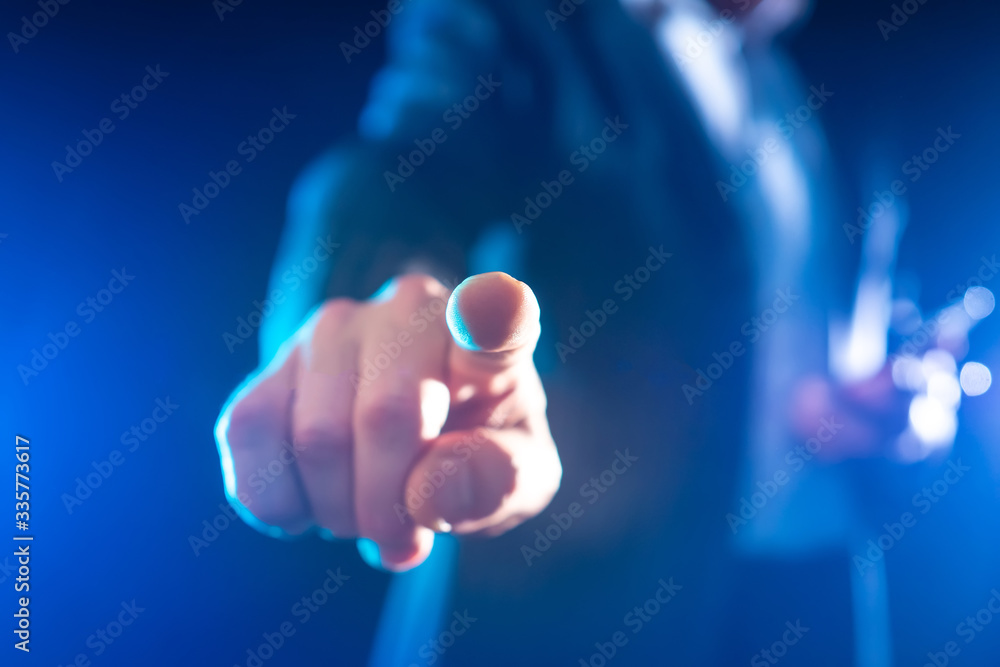Poster simulated finger tapping on the screen. human hand close-up. pressing the desired key. calling the m
