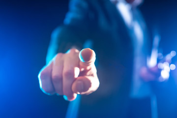 Simulated finger tapping on the screen. Human hand close-up. Pressing the desired key. Calling the...