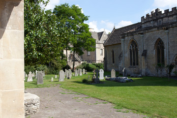 Fototapeta na wymiar Bibury (England), UK - August 05, 2015: The cemetery in Bibury village, Gloucestershire, England, United Kingdom.