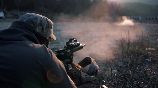 Professional shooter shoots a target at a great distance