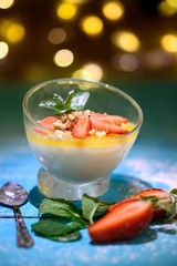 delicious Panna cotta on a blue background