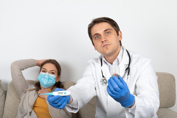 Doctor consulting female patient at home