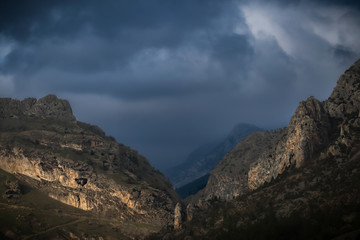 Fototapeta na wymiar View of the foggy canyon. Turkey.