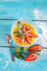 delicious Panna cotta on a blue background