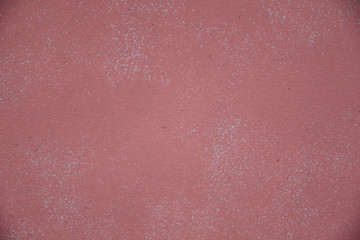 Fototapeta premium rough empty pink wall texture