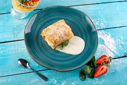 Layer cake with cream Napoleon milfey vanilla slice with mint