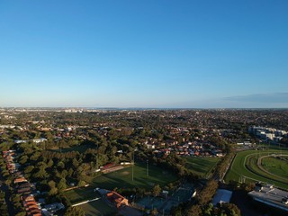 Drone panoramic aerial view of Sydney NSW Australia city Skyline and looking down on all suburbs 