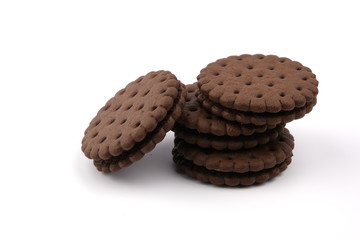 chocolate cream sandwich cookies with cream filling on a white background