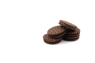 chocolate cream sandwich cookies with cream filling on a white background