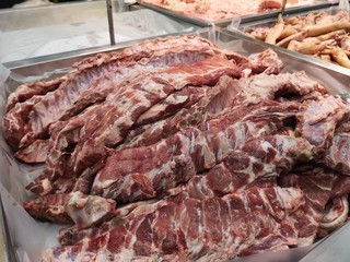 sparerib pork on a stainless steel tray in supermarket