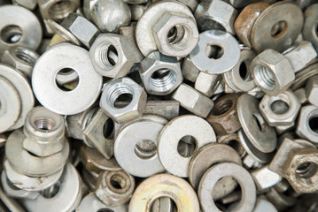 bolts and washers on the corner. building materials . metal products.