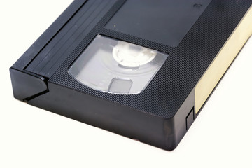 Detail of a VHS format videotape isolated on a white background