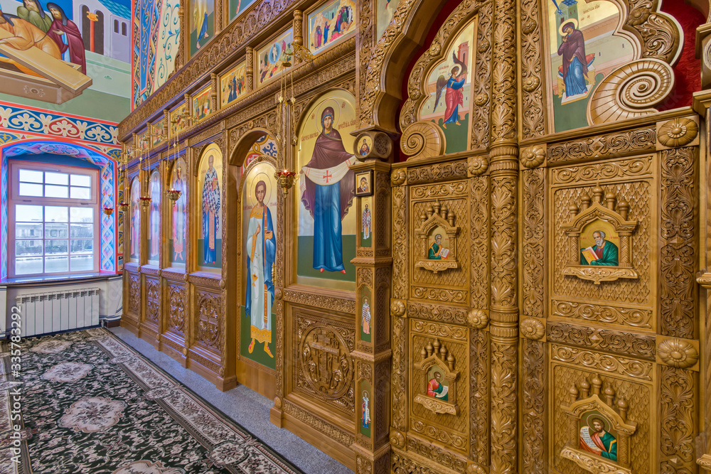 Wall mural Eastern сhristian orthodox сhurch of Byzantine tradition. Traditional religious paintings and icons. Altar and iconostasis