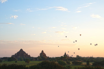 Landscape of ancient pagoda and balloon floating over the orange sky sunrise in the morning at Bagan , Mandalay , Myanmar - Scenery background