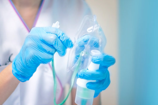 Nurse Preparing Oxygen Mask , Putting Medication For The Medical Care In Hospital For Ill Person Having Breath Problems