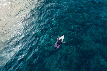 two surfers waiting for a big wave, aerial photography of men on the boards