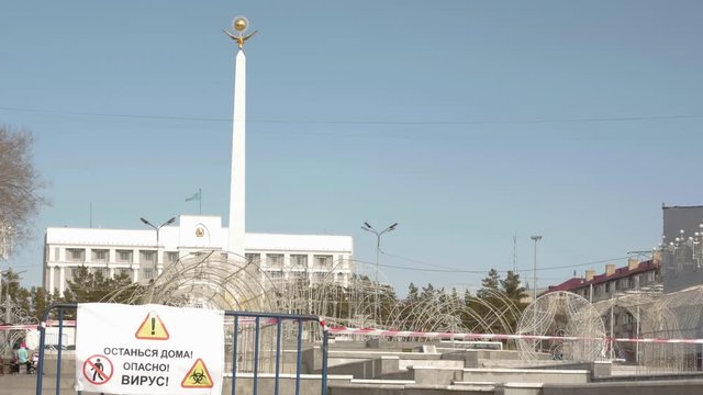 Karaganda, Kazakhstan - 3nd April, 2020 -The streets of the city are quarantined closed due to COVID-19 or Coronavirus outbreak lockdown. Information warning sign about quarantine measures in public p