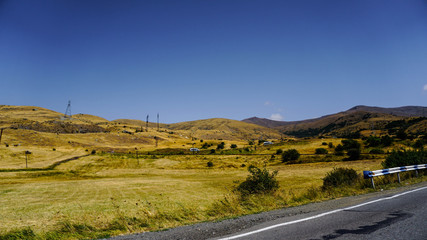 Mountain view road at sunset