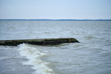 Obraz premium Dirty sea water, a storm in the sea.
