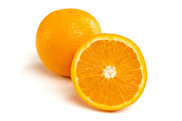 Orange, whole and half, on a white background.