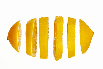 Juicy sliced lemon on a white background.